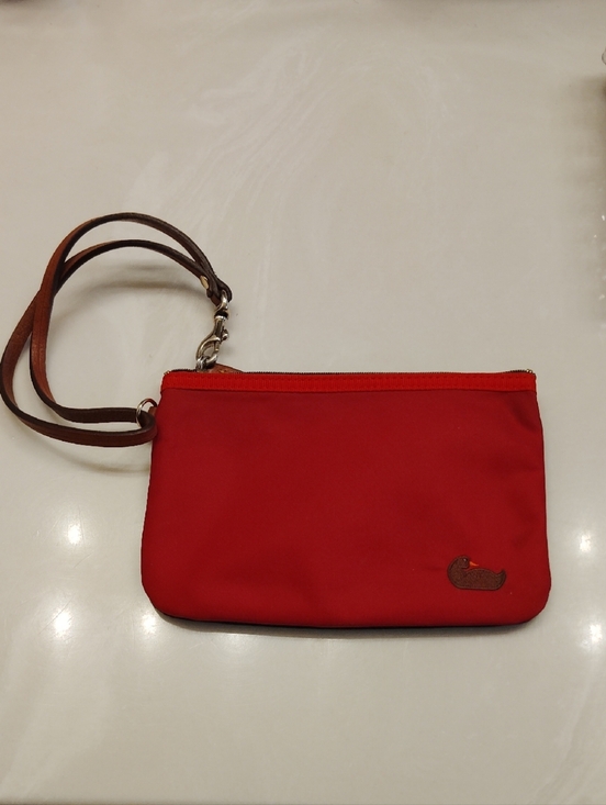 Dooney & Bourke Handbags - Dooney & Bourke Red Wristlet with Brown Strap!!